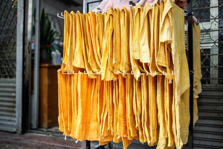 Towels Are Left to Dry Outside an Old Hairdresser Shopの写真素材