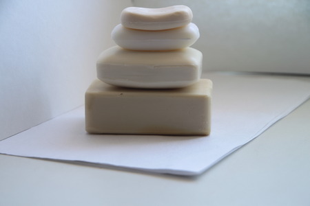 Four soap bars lying on each otherの写真素材