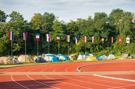 Collection of flags on the stadium, competition in summerの写真素材
