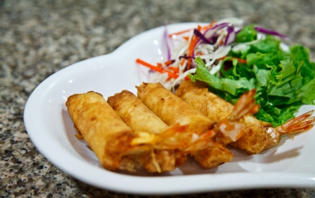 spring rolls is appetizer made from fried shrimp in thai restaurant