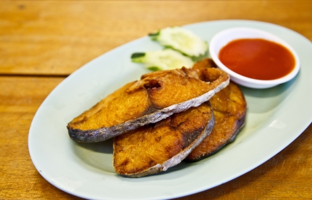 fried fish with sauce for meal timeの写真素材