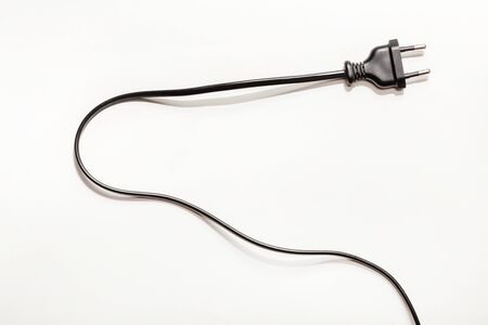 wires and plugs for sockets on white backgraund