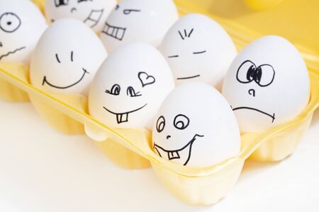 
set of funny eggs with painted facesの写真素材