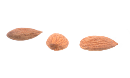 Almonds isolated on whiteの写真素材