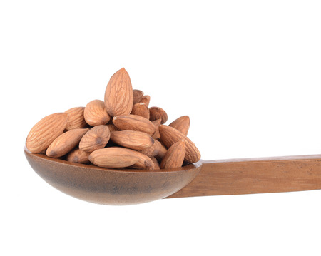 Almonds isolated on whiteの写真素材