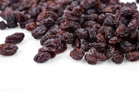 dried grapes on whiteの写真素材