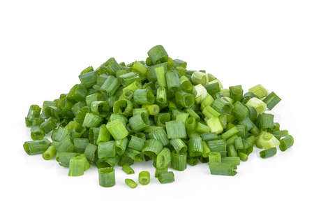 Sliced green onions on a white background.の写真素材