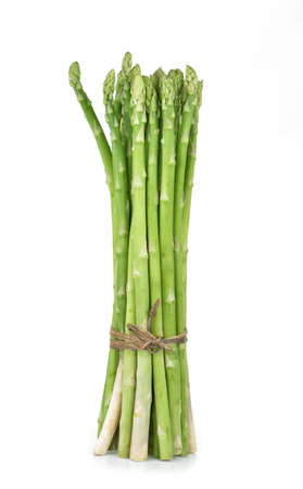 green asparagus isolated on whiteの写真素材
