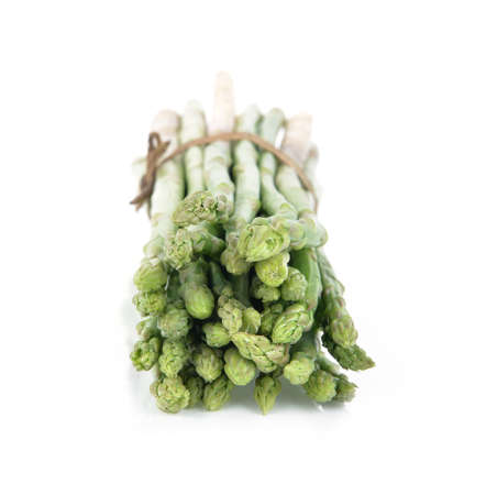green asparagus isolated on whiteの写真素材