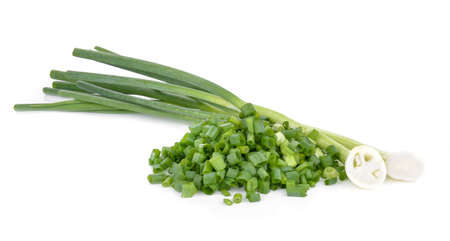 Sliced green onions on a white background.の写真素材