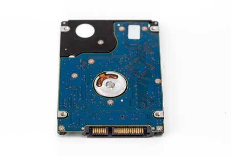 Laptop 2.5 inch SATA harddisk for the laptop close-up isolated on a white backgroundの写真素材