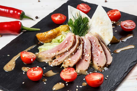 Roasted duck breast fillet with vegetablesの写真素材