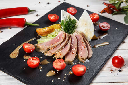 Roasted duck breast fillet with vegetablesの写真素材