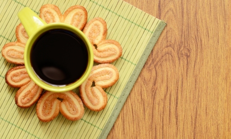 Cookies around a cup of coffeeの写真素材