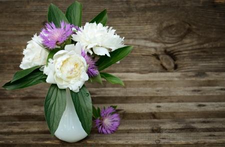 Bouquet of peonies on gray wooden backgroundの写真素材