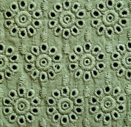 Green embroidered fabric with floral patternの写真素材