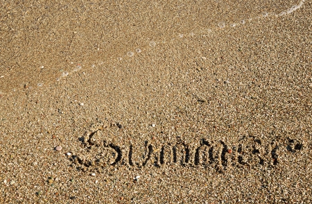 Summer background with beach pebbles and sea waveの写真素材