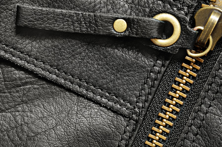 Black leather bag part with zip for backgroundの写真素材