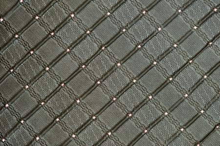 Closeup of gray checkered silk fabric for tie