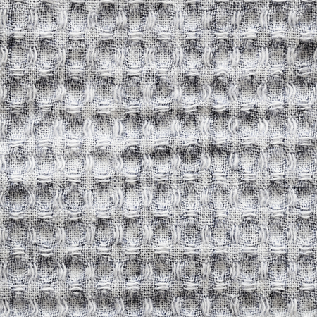 Closeup of gray checkered fabric for backgroundの写真素材