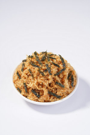 Fried food in a bowl on a white background