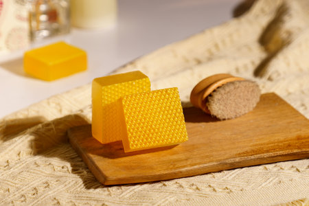 Spa composition with natural honey comb, soap and bath salt on white backgroundの写真素材