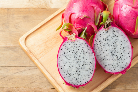 Dragon fruit on wooden backgroundの写真素材