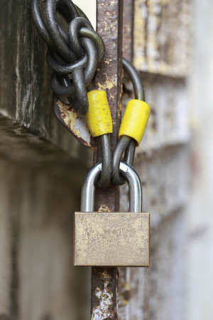 The master key and chain locked on the gateの写真素材