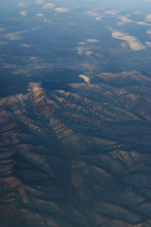 a aerial view of mountains over Siberia in winterの写真素材