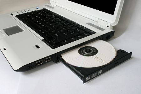 CD on laptop for burning and backupの写真素材
