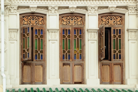 Brown clolour wooden windows with decoration from Singapore china town.の写真素材