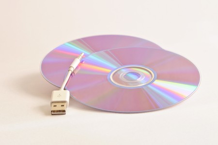 CD and headphone on white backgroundの写真素材