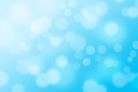 bokeh blue lights on blue gradient backgroundの写真素材