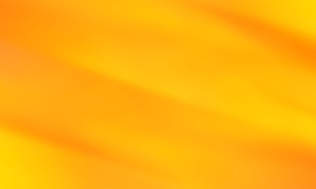 abstract orange yellow blurred defocused fabric cloth texture with shinny backgroundの写真素材