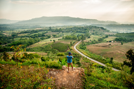 Photographer take a photo at green mountain,の写真素材