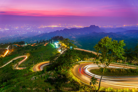 The light trails on the moutain street in morning, Thailand