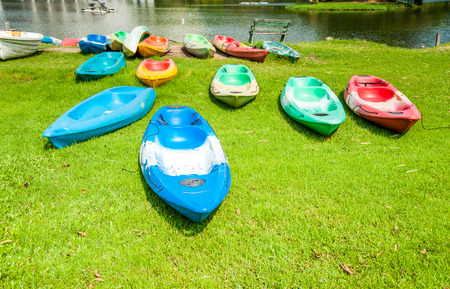 Park at sunny day with canoe boatの写真素材