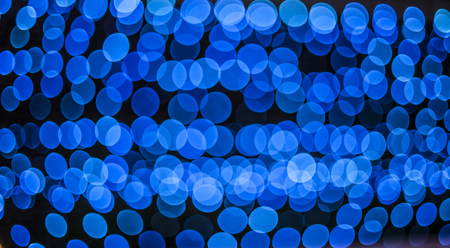 abstract background of blurred blue lights with bokeh effect, new year 2016の写真素材