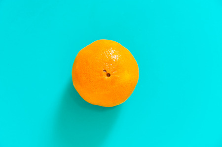 Fresh orange fruits and juice on marble table.の写真素材