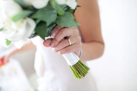 Bride holding wedding flower bouquetの写真素材