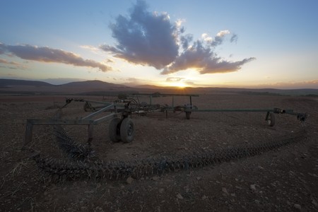Image of a farm implement at Sunset in the Western Cape Province in South Africaの写真素材