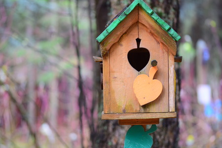 Garden ornaments: a bird house.の写真素材