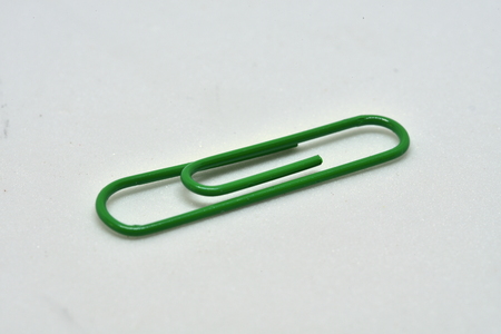 Usual office green paper clipの写真素材