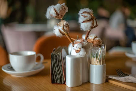 Auxiliary devices on the table in the cafeの写真素材