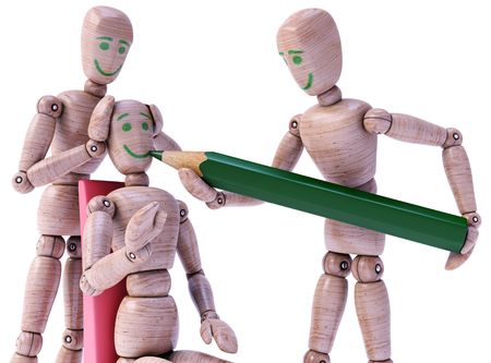 Wooden dolls drawing a happy face each other. Concept of expression and social assistance.の写真素材