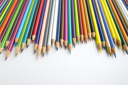 Several colored pencils lined up forming a graph の写真素材