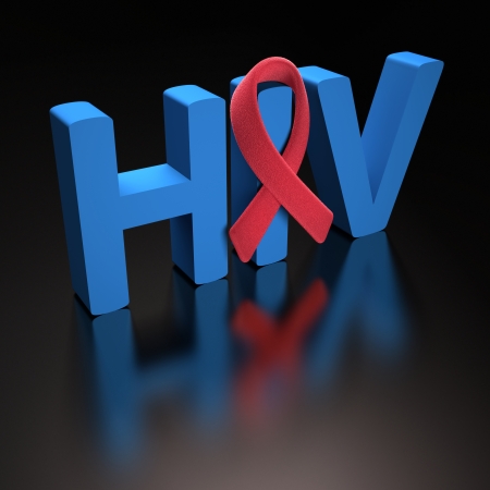 Red ribbon, symbol of a commitment to the fight against HIV/AIDSの写真素材