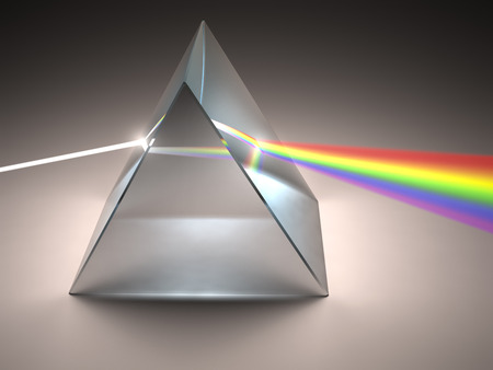 The crystal prism disperses white light into many colors.の写真素材