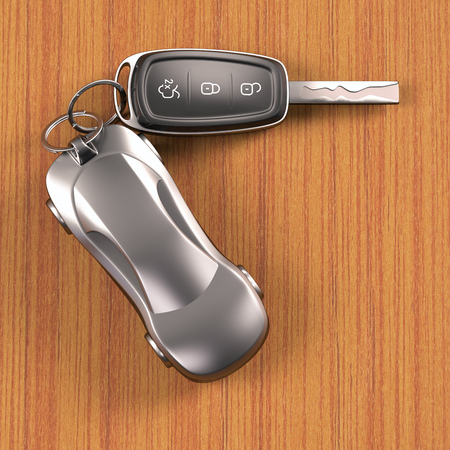 Key car and key ring over the table. Clipping path included.
