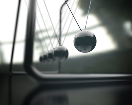 3D illustration of Newton's cradle, concept of conservation of momentum and energy.の写真素材